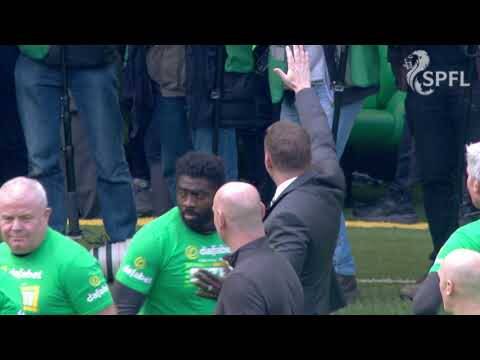 Rodgers and Celtic players celebrate after Rangers rout