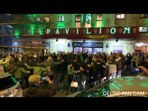 Celtic Fans Doing the Huddle on Glasgow Street
