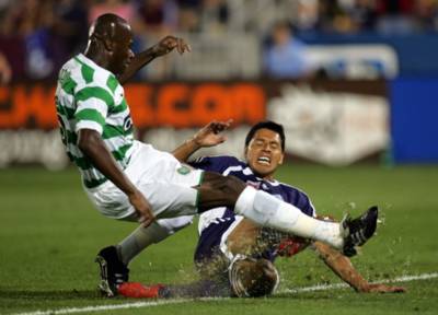Craig Moore ran away from Bobo Balde after a Celtic derby match at Ibrox Craig Moore ran away from Bobo Balde after a Celtic derby match at Ibrox