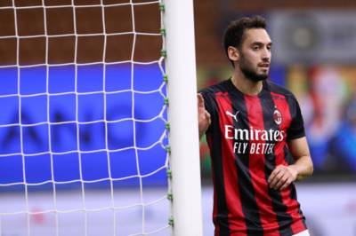 AC Milan dealt bitter Celtic blow as Hakan Calhanoglu leaves training on crutches ahead of Europa clash AC Milan dealt bitter Celtic blow as Hakan Calhanoglu leaves training on crutches ahead of Europa clash