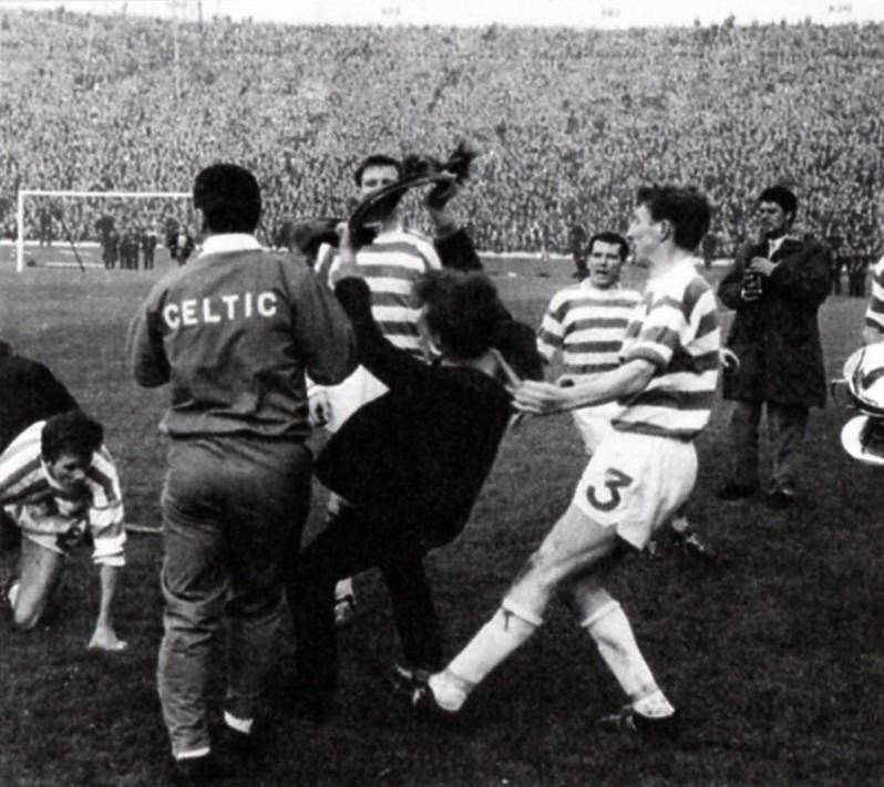 Celtic 2 Rangers 1 – A Yogi double then pitch invasion as Rangers fans assault Ian Young and Neil Mochan Celtic 2 Rangers 1 – A Yogi double then pitch invasion as Rangers fans assault Ian Young and Neil Mochan