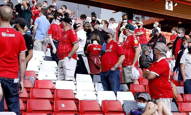 Football fans may NOT have to wear masks inside stadiums and undergo temperature checks Football fans may NOT have to wear masks inside stadiums and undergo temperature checks