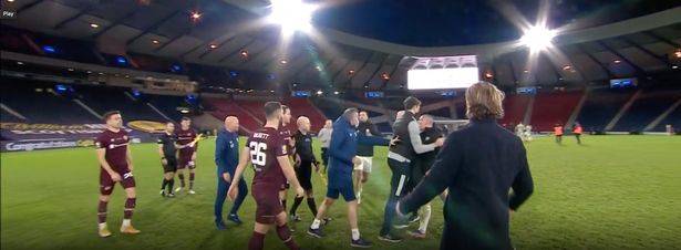 Scott Brown held back as Hearts players fume at Celtic win Scott Brown held back as Hearts players fume at Celtic win