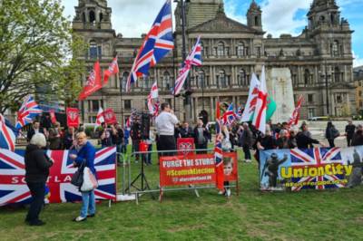 Cringe and watch Ra Peepa mumble GSTQ to electric guitar solo at George square rally Cringe and watch Ra Peepa mumble GSTQ to electric guitar solo at George square rally