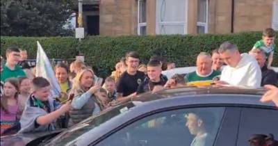 Alistair Johnston mobbed by Celtic fans ‘doing Huddle’ down London Road after title party