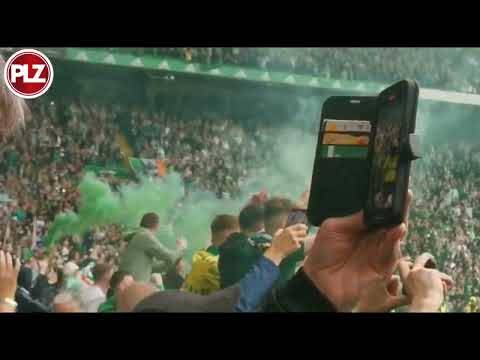 Celtic captain Callum McGregor celebrates with fans after lifting Scottish Premiership trophy