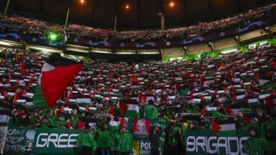 Celtic fined over fans displaying Palestine flags