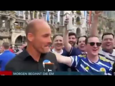 Scotland Fan Flashes German Tv Reporter in Munich