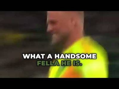 In front of the GREEN WALL