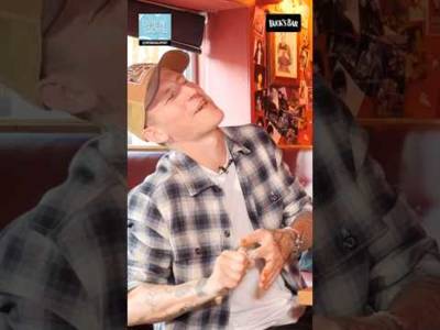 HEâ€™S SWEATING ðŸ¥µ ðŸ” Nathan Evans extreme hot wings reaction #nathanevans #football #wingschallenge