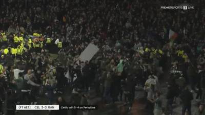 Celtic fans storm Hampden track as trophy presentation delayed