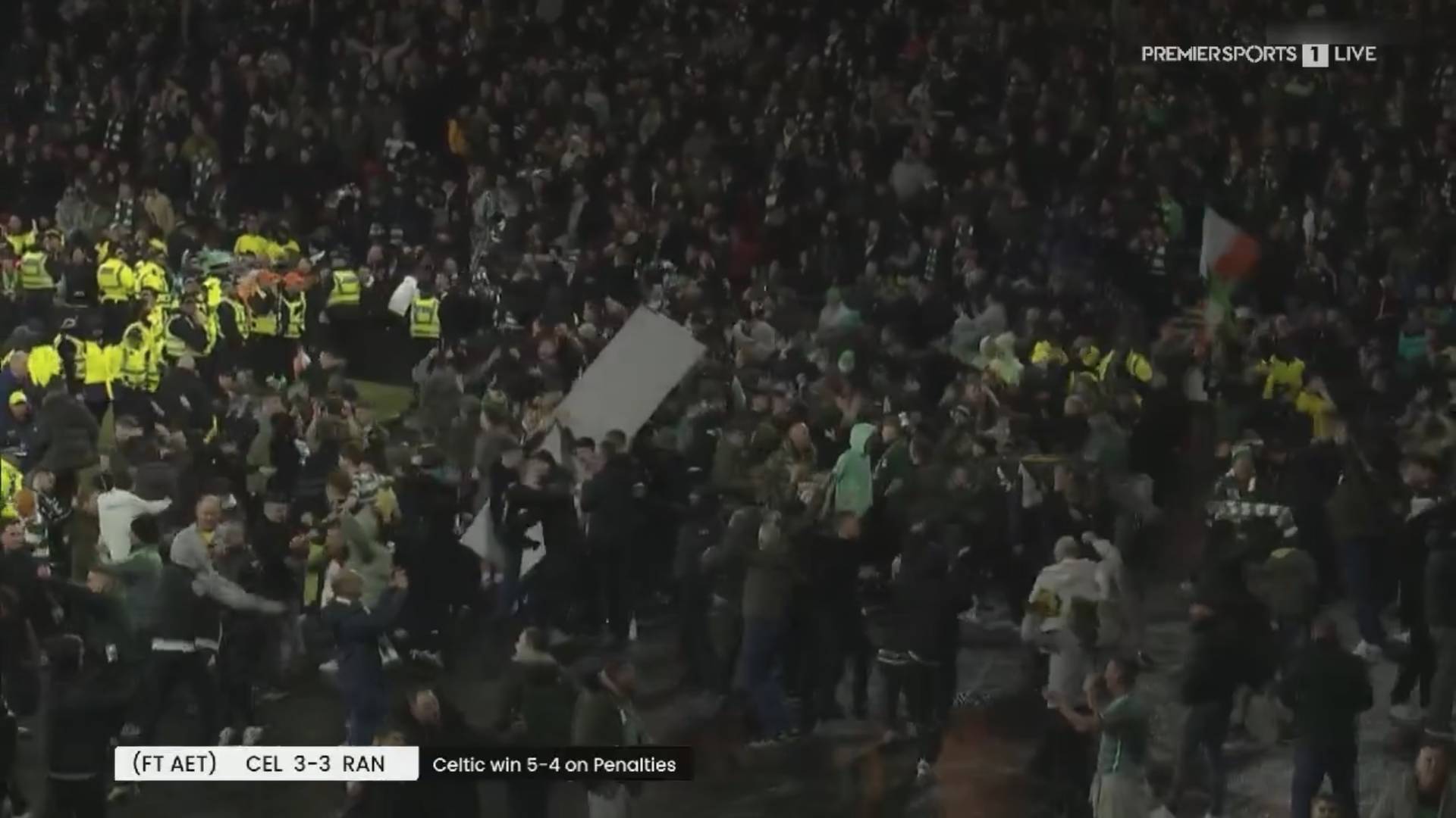 Celtic fans storm Hampden track as trophy presentation delayed