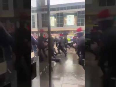 Rangers fans in Santa hats RUNNING away from celtic
