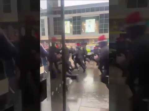 Rangers fans in Santa hats RUNNING away from celtic