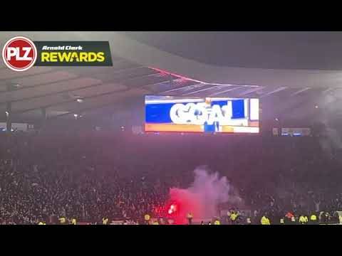 Rangers fans react to their opening goal at Ibrox.