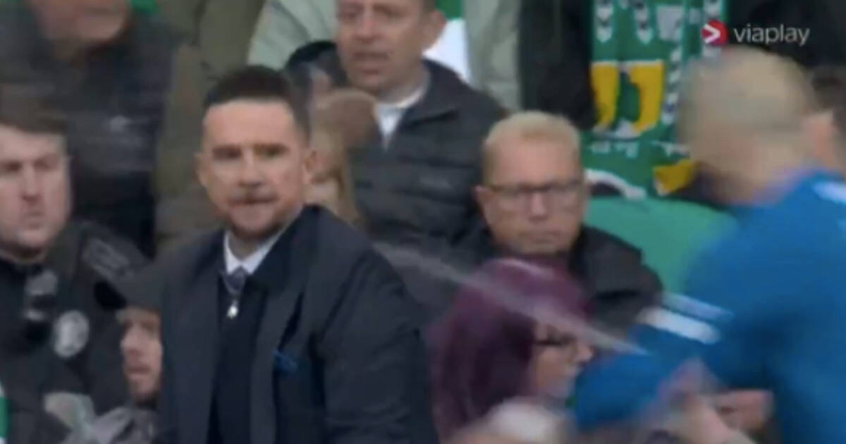 Rangers players SQUIRT WATER at Celtic fans as wild celebrations spark Parkhead fan fury