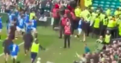 The moment Nedim Bajrami chucks water at raging Celtic fans as Sky Sports cameras miss Cerny’s Rangers accomplice