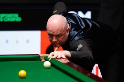 Snooker star John Higgins aims playful jab dig as Ally McCoist