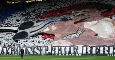 Rangers unfurl huge banner with shotgun pointed at Celtic supporters