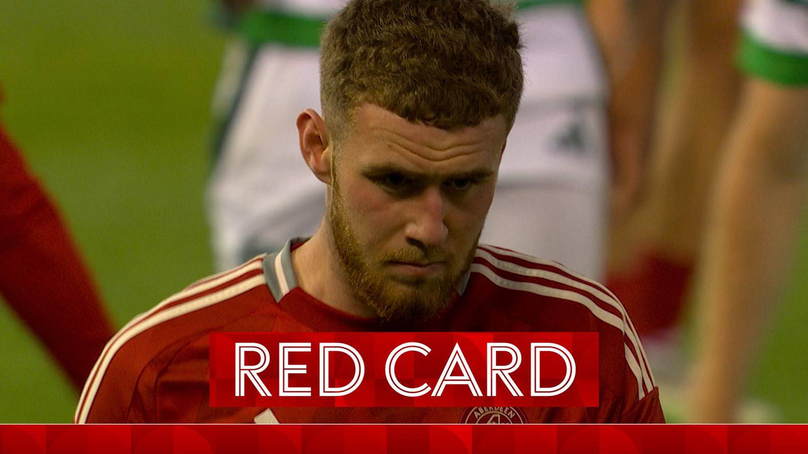 Spurs’ Aberdeen loanee Dorrington is shown a red card!