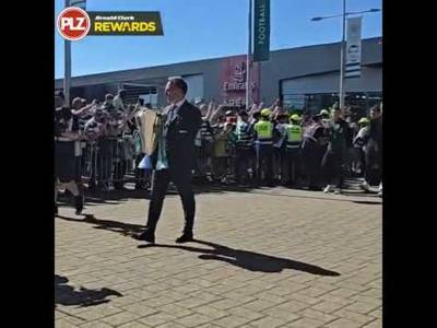 Brendan Rodgers arrives at Celtic Park with the Scottish Premiership trophy