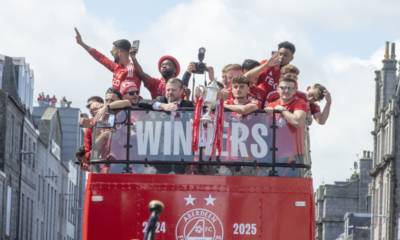 Gallery: All the best pictures of the cup-winning Dons squad on the parade bus