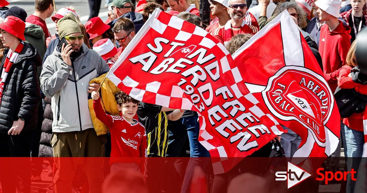Scottish Cup winners Aberdeen parade trophy through city on open-top bus