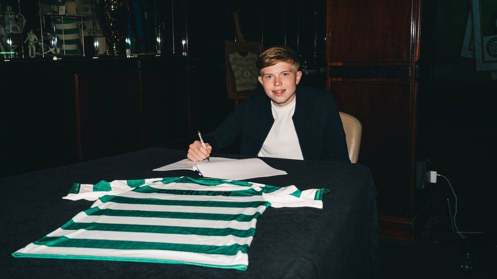 Michael Charlton signs his first professional contract with Celtic