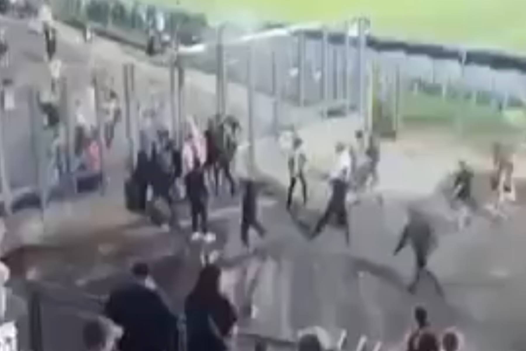 Moment Celtic & Ajax supporters clash during Como Cup match