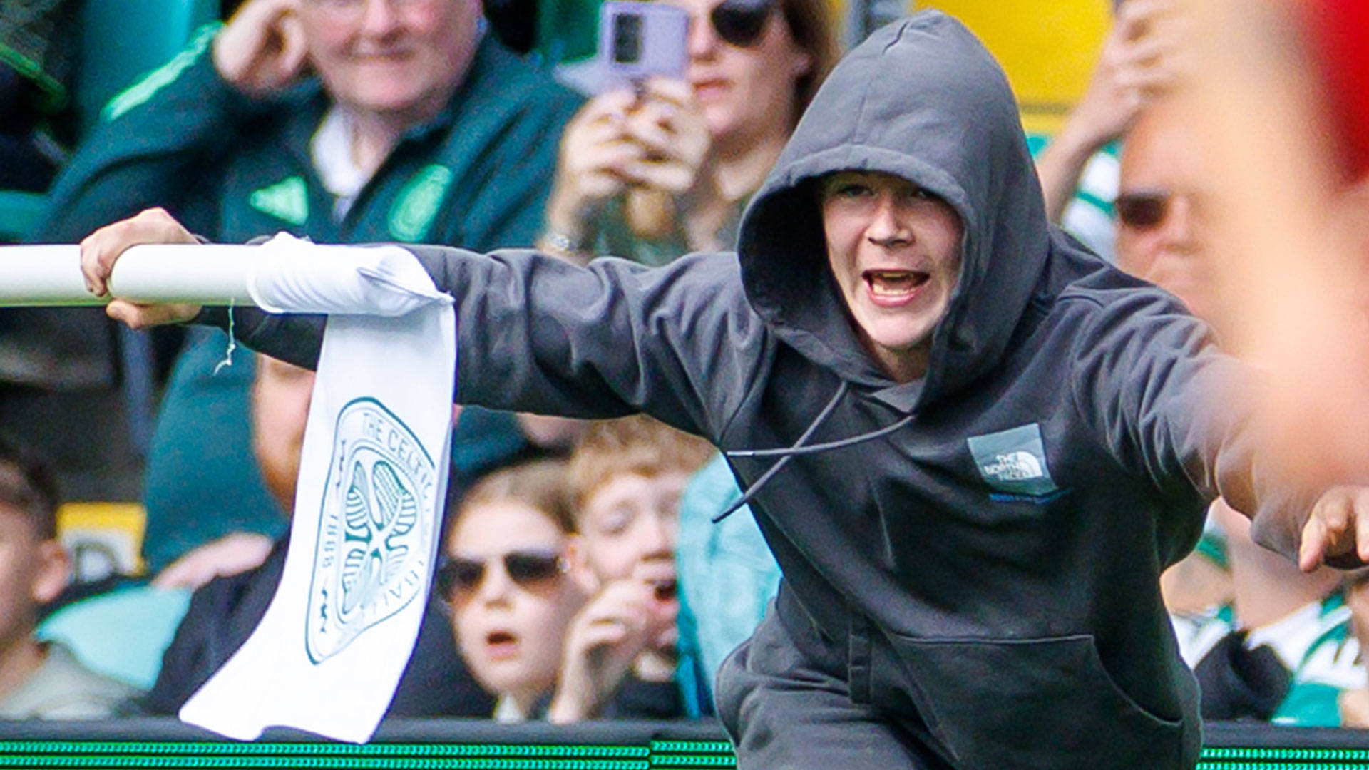 Man Utd legends clash against Celtic interrupted as pitch invader steals corner flag and runs down tunnel
