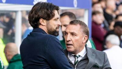 Rodgers hits out at previous Rangers management as he defends Martin