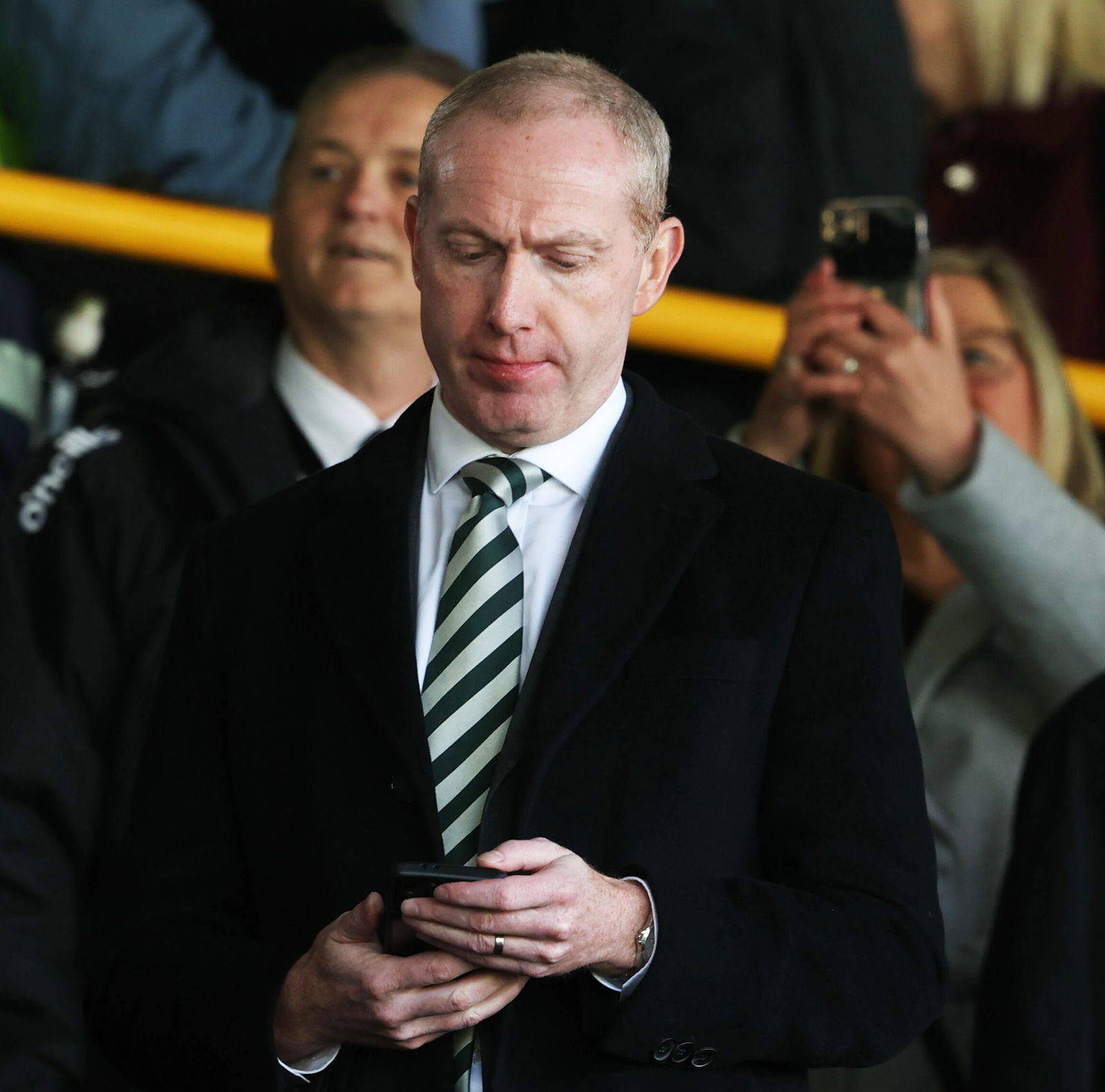 Watch nervous Nicholson react to Celtic fan protests