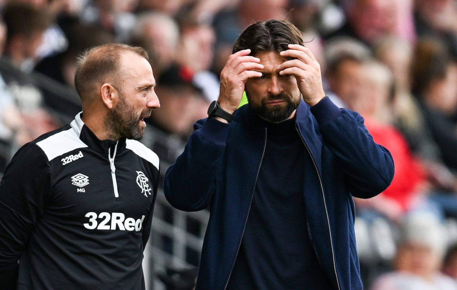 Fear and loathing at Ibrox: Russell Martin is down and out.
