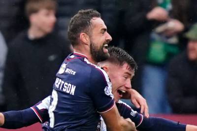 Dundee end 37-year wait for a home win over Celtic as Hearts stay five points clear