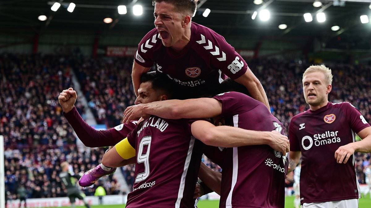 Shock in Scotland as Hearts go EIGHT POINTS clear at the top of the table after beating Celtic &ndash; while Rangers languish back in eighth place