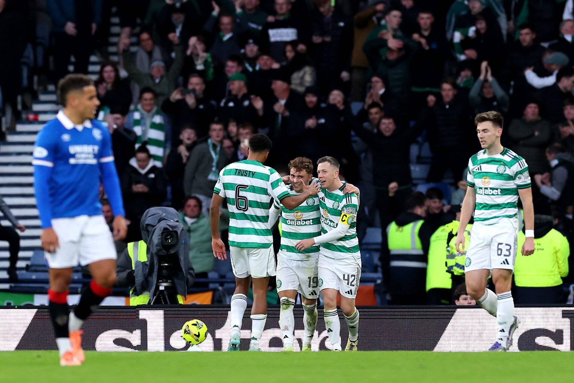 Steven Davis shows his class towards Callum McGregor after Celtic beat Rangers at Hampden