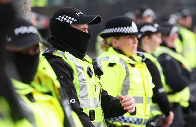 Dawn raids on homes of three young Celtic fans; doors kicked in