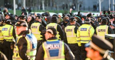 Furious Celtic fans face down police during front door protest as they demand board sacked after Rangers defeat Furious Celtic fans face down police during front door protest as they demand board sacked after Rangers defeat