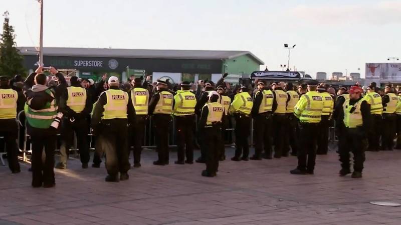Large group of fans rally outside Celtic Park to protest Rangers defeat