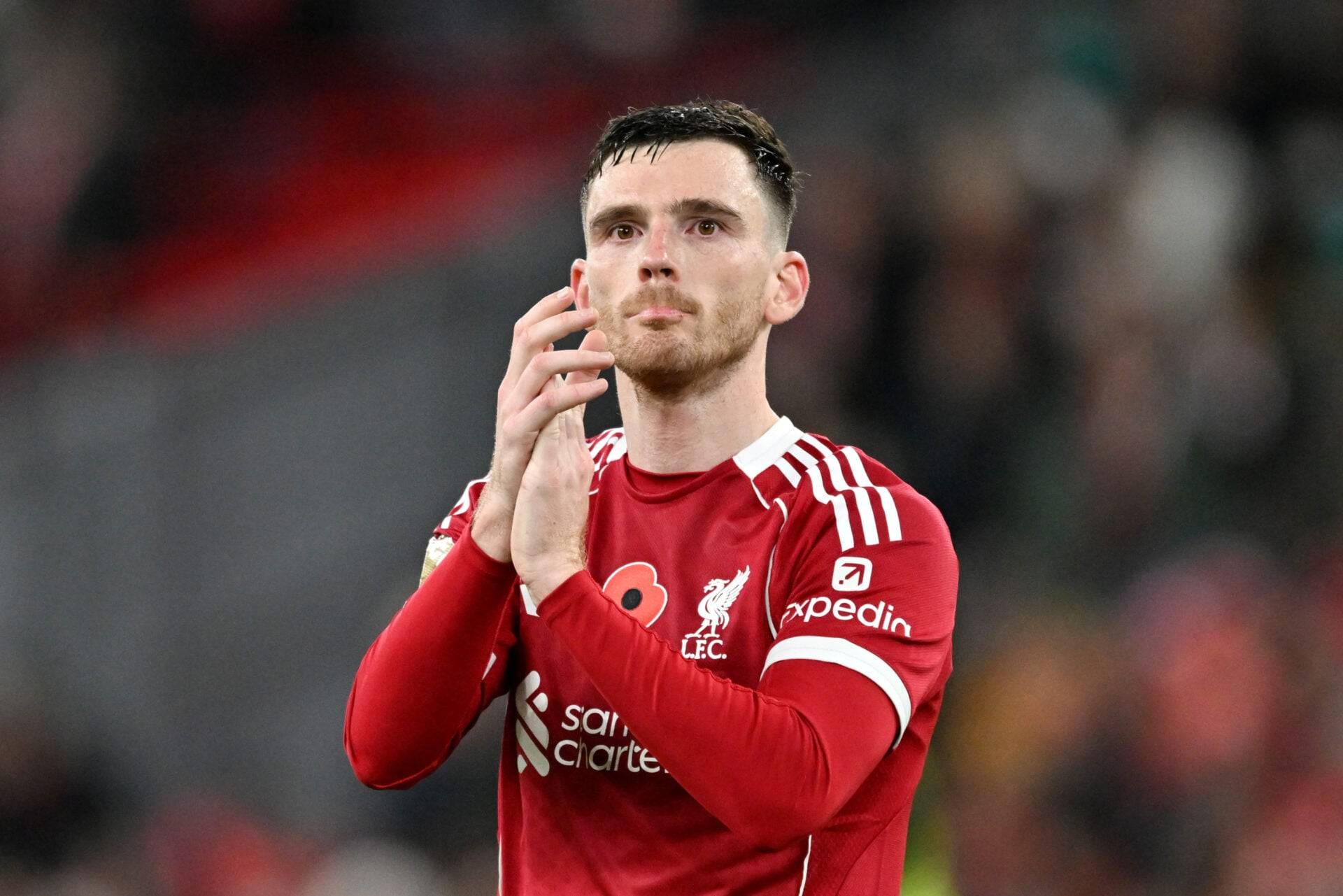 Andy Robertson and Declan Rice react as Alex Oxlade-Chamberlain signs for Celtic