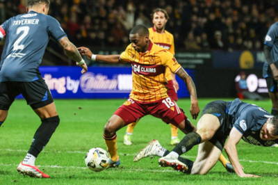 Falls to the ground in the box, handles the ball, and gets a free kick for it...the wacky world of Steve McLean and John Beaton