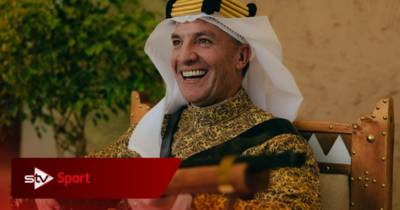 Ex Celtic manager Brendan Rodgers poses with gun wearing traditional Saudi dress