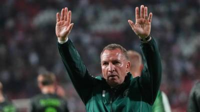 Ex-Celtic boss Brendan Rodgers spotted posing with a RIFLE as fans say ‘got to be AI surely’