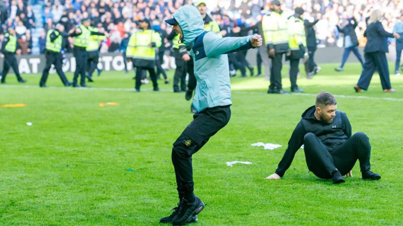 Shock moments Rangers thug karate kicks Celtic supporter in the head and Hoops yob attacks Gers rival in pitch battles