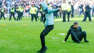Shock moments Rangers thug karate kicks Celtic supporter in the head and Hoops yob attacks Gers rival in pitch battles