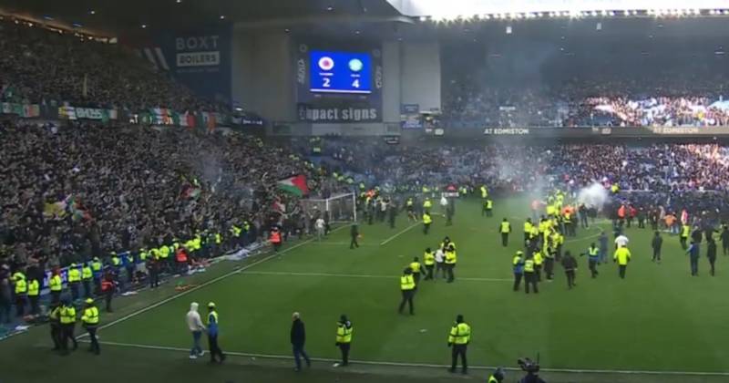 Celtic staff member ‘attacked’ as Rangers fans storm pitch in ugly O** F*** scenes