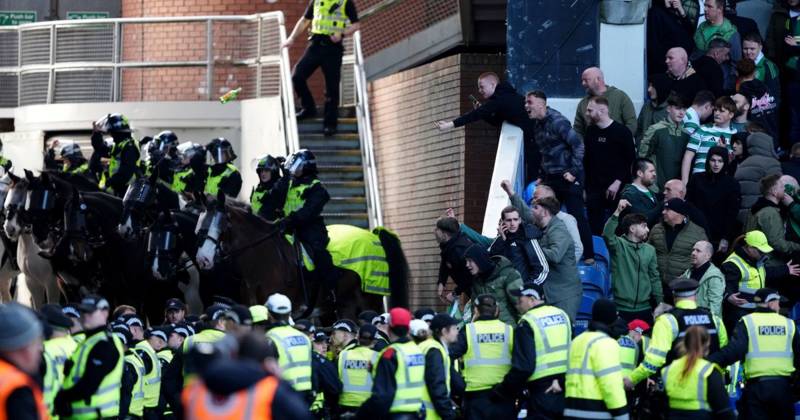 Disgusted Celtic fan reduced to tears by Rangers mayhem as Ibrox pitch invaders set the Hotline on fire