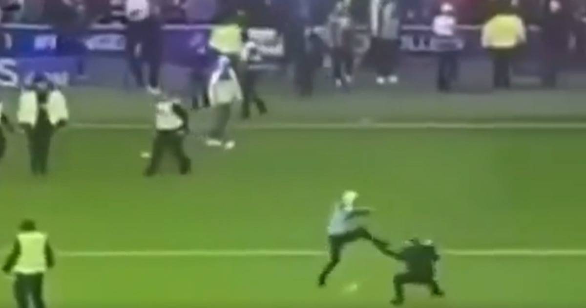 Fan floored in shocking ‘kick’ assault during Rangers v Celtic pitch invasion chaos