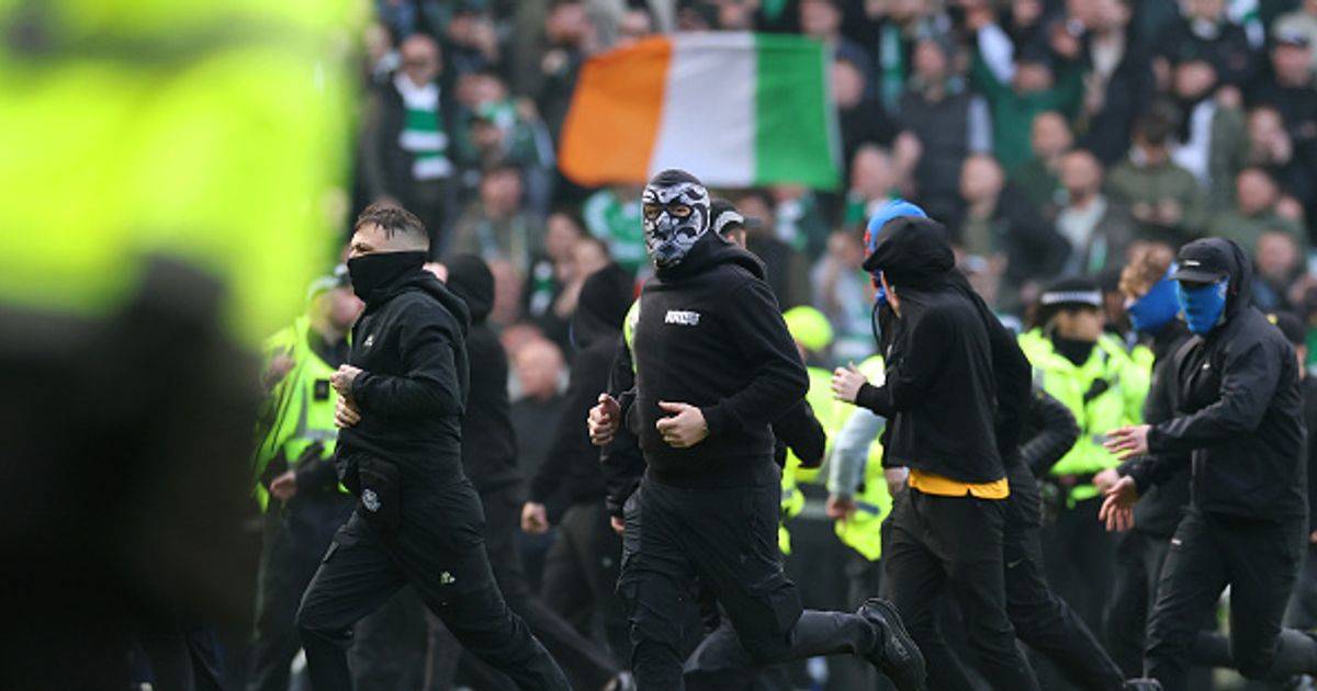 Rangers and Celtic fans clash on Ibrox pitch after Hoops win on penalties
