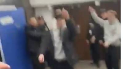 Watch as injured Celtic players seen celebrating with jubilant fans inside Ibrox